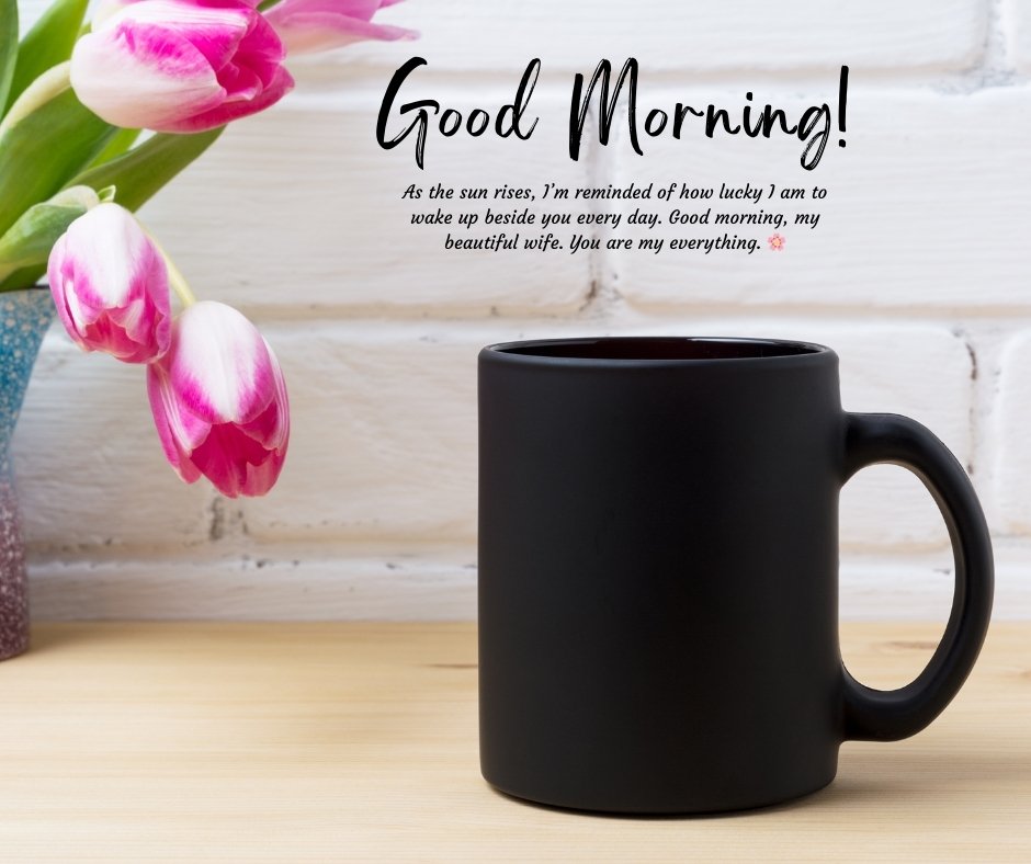 Good Morning Beautiful Messages for Wife with a black coffee mug and pink tulips in a vase, creating a warm and loving morning atmosphere.